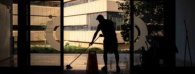 Man cleaning in the building